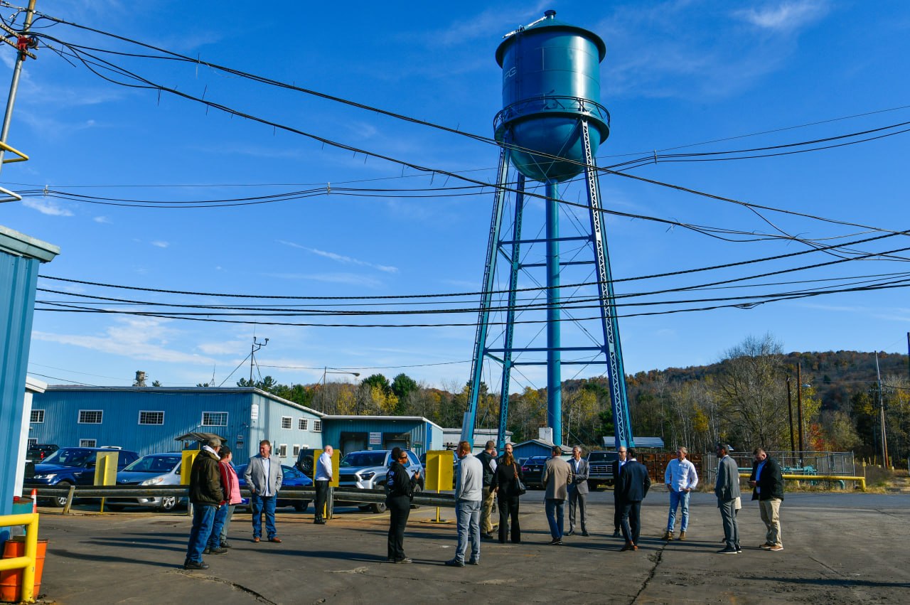 Guests gathering near the water tower