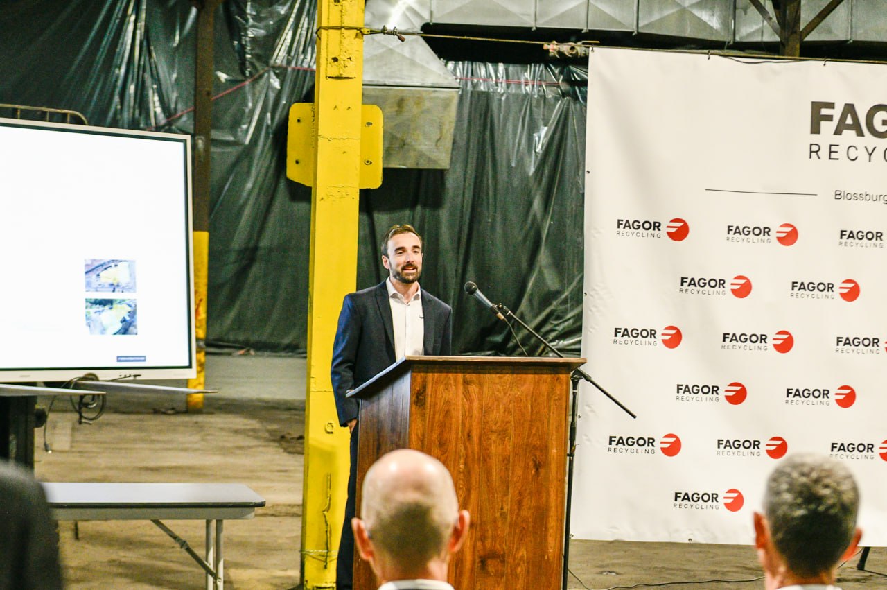 Speaker at podium — Fagor Recycling Blossburg
